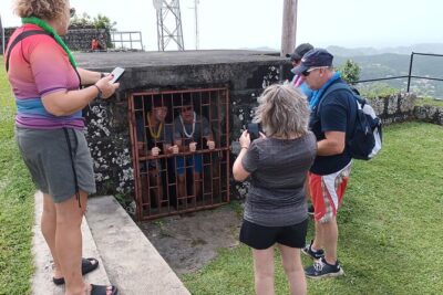 Half-Day Hawaiian Leis Chocolate Waterfalls Beach Tour - Annandale Waterfall & Forest Park: a short swim with local music energy