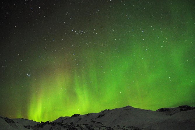 Northern Lights Minibus Tour with Hot Cocoa, Blankets & Photos - Stop 1 in Reykjavik: Pickup That Sets the Tone