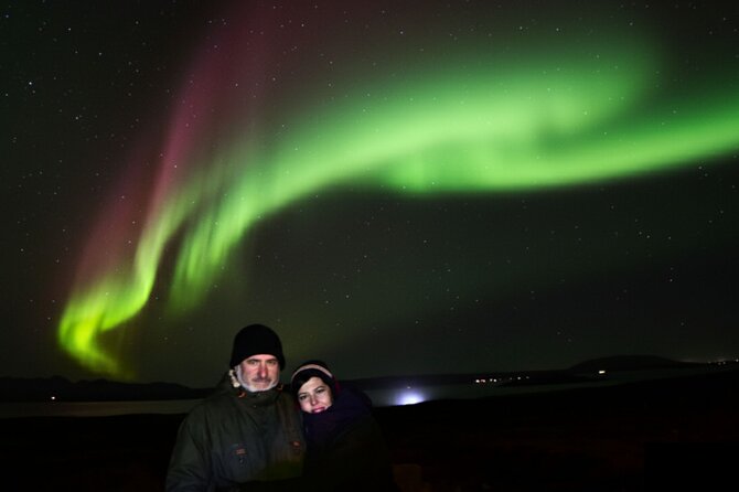 Northern Lights Tour: Cozy Night Adventure with Hot Chocolate - Leaving Reykjavik: The Warm Ride Out to Darker Skies