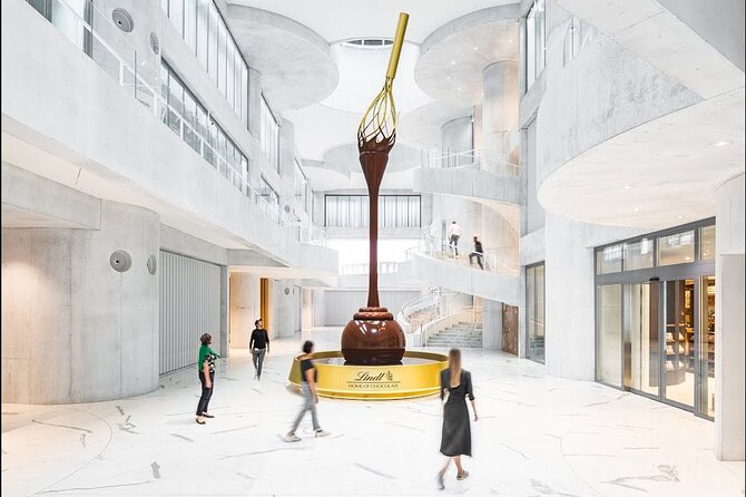 Tour in Lindt Home of Chocolate Museum From Zurich With pickup - Panoramic Production Views and How the Audio Guide Keeps Moving