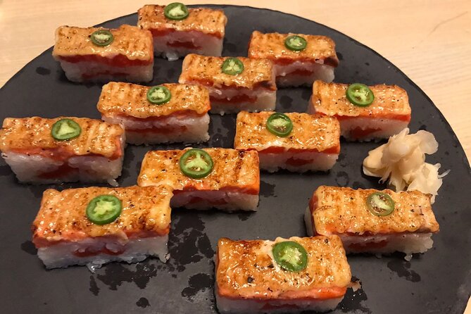 Vancouver Food Tour with 6 Tastings of Sushi, Chocolate, and more - Maple Tree Square: a quick statue stop that adds context fast